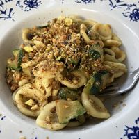Fresh pasta with zucchini, zucchini flower and roasted pistachio    at Il Cormorano in Cala Gonone