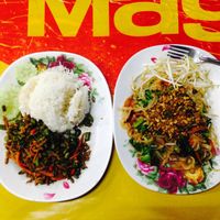 Left - veggies with fresh basil. I believe there was some sort of moc meat too. Right - pad  thai  at Nong J - ร้านน้องเจ in Phuket