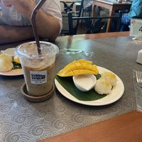 Iced oat latte and mango sticky rice   at Kin & Koff Café in Bangkok