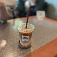 Iced oat milk latte  at Kin & Koff Café in Bangkok