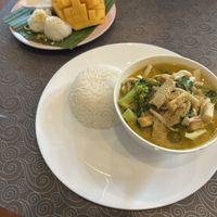 Mango sticky rice and green curryy  at Kin & Koff Café in Bangkok