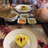 Entrées, dips, fresh bread and hot drink  at Shaman Restaurant in Cusco