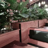 Interior seating facing counter at Frittenwerk - Alexa Mall in Berlin