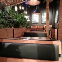 Interior seating facing place to put waste at Frittenwerk - Alexa Mall in Berlin