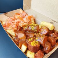vegan 'Currywurst' with fries (7.90€) + extra tomatoes (0.80€) at Frittenwerk - Frankfurt Hbf in Frankfurt