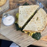 Best egg sandwich (sub sourdough bread, tofu scramble, and vegan cheese); had spicy aioli in the side   at The Butcher's Daughter - Nolita in New York City