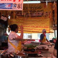 look for the big yellow sign at Vegan Thai Food Stalls in Bangkok