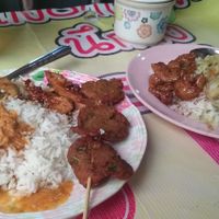 One Thai green curry, one Thai red curry and some mock meats. at Vegan Thai Food Stalls in Bangkok