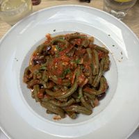Spirulina pasta with aubergines and olives oil  at Coogi's Pizzeria & Bistrot in Mdina