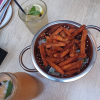 Sweet potato fries, passion fruit smoothie, lemonade at Coogi's Pizzeria & Bistrot in Mdina