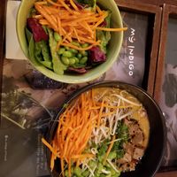 Malaysian Buddha bowl (added tofu, carrots, edamame), Side salad at my indigo - Auerspergstrasse in Salzburg