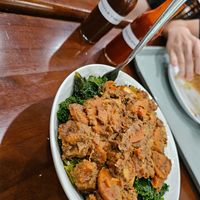 Tahini Ginger Tofu Bowl w/ quinoa (on bottom) with what appears to be homemade/local hot sauce (also very tasty) at Sunflower Cafe in Nashville