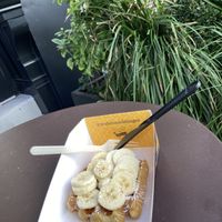 Waffle with banana topping at Wafels & Dinges in New York City
