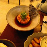 Salmon tartar with rice sesame cracker at Soy Club in Stuttgart