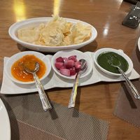 Papa dams and chutney as you peruse menu.  at Queen's Tandoor in Jakarta