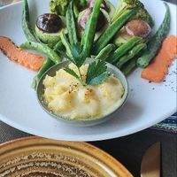 Pan fried mixed vegetables with mashed potatoes (vegetarian) at The Rice Signature Restaurant - Sapa Clay House in Lao Cai