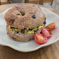 Local Wild Mushroom Sourdough Toast with homemade turmeric hummus in a blueberry bagel at Wanaka in Hong Kong Island