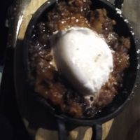 Peach pecan cobbler with vegan ice cream at Indigo Cafe in Cleveland