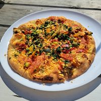 Pizza vegana at CuevaLinda Chiringuito in Asturias