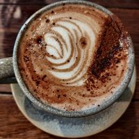 Hot chocolate on oat at Sweet Bones Bakery Cafe in Scullin