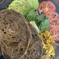 Avo toast with added tofu scramble at Sweet Bones Bakery Cafe in Scullin