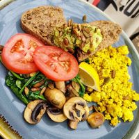 Smashed avo (with an expensive side of tofu scramble) at Sweet Bones Bakery Cafe in Scullin
