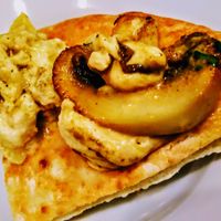 Babaganoush and mushroom hummus on a pita at Ta-im in Tokyo