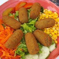 Spinch Croquettes - Convenience food on Salad at Sunset Beach in Sao Miguel