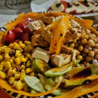 Buddha bowl with tofu, brown rice, chickpeas, avocado, veggies and soy sauce at Royal Garden Juice Bar in Budva