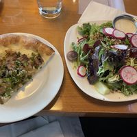 Vegan Kale+mushroom pizza and Vegan spring greens + grains salad  at Earls Kitchen + Bar in Vernon