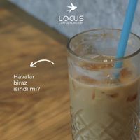 Vegan oat milk ice latte   at Locus Coffee Roastery in Ankara