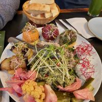 Large mixed starter platter: eggplant rolls, phkali (balls of spinach/beetroot/carrot on cornbread), princess beans, peppers with walnut, seasonal veggies (30€), Attention: by de at SO RE Restaurant & Bar - Georgische Küche in Dusseldorf