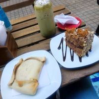 Empanada, matcha latte frío, torta manjar at Happy Vegan Coffee in Santiago