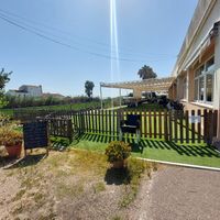 Outdoor seating area (wouldn't recommend in summer) at Arrocería El Rek in Valencia