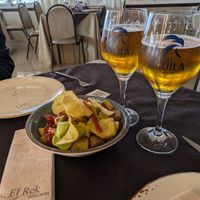 Patatas bravas - potatoes with a squirt of cheap tasting ketchup at Arrocería El Rek in Valencia