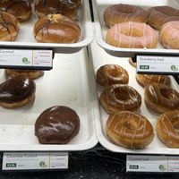 Salted caramel, strawberry glazed, chocolate with vanilla filling, caramel glazed 🍩 (regular donut is vegan as well, not in the picture)  at Krispy Kreme in Edinburgh