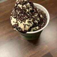 Hard to tell, but underneath that mountain of vegan whipped cream and hot fudge sauce is a generous “single” of matcha mint chip ice cream   at Swanky Scoop in Woodinville