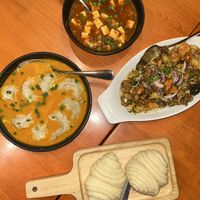 Jhol momos (soup dumplings), Mala tofu, crispy tangy vegetables, tingmo (steamed bread)   at Tibet Kitchen - ทิเบต คิทเช่น กรุงเทพมหานคร in Bangkok
