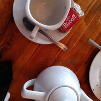 Cup of tea with Biscoff biscuit (May 2025) at The Old Boat House in Amble