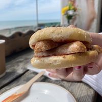 Vegan bap (2 sausages in a brioche bun)  at Whitecliffs Saltdean in Brighton