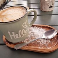 Pistachio oatmilk latte at Quase Café in Lisbon