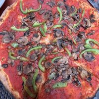 Cheeseless wood fired pizza with fresh mushrooms and green peppers   at Frankie & Fanucci's in Mamaroneck