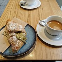 Vegan pistachio cornetto with double espresso at Grey Kaffee in Vienna