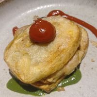 Melanzane fritte con coulis di pomodoro e al basilico e fermentino. at il Brucaliffo Cucina in Castiglione Dorcia