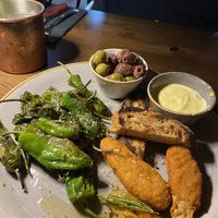 Sharing platter, padron peppers, olives, vegan goujons   at The ASH - Köln MesseCity in Cologne