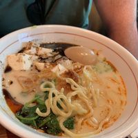 Spicy Creamy Vegan Ramen with salted egg added. Perfectly spicy & creamy, just like the name says. Drank all the broth!  at JINYA Ramen Bar - 2nd and PCH in Long Beach