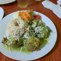 Brown rice, small salad and quinoa veggie meatballs at Dos Girasoles in Lima