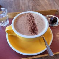 Hot chocolate with soy milk and a free piece of chocolate! at Laurent Gerbaud Chocolatier in Brussels