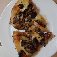We added mushroom and olives to the margarita pizza, amazing! at Vegan House - Bukit Damansara in Kuala Lumpur