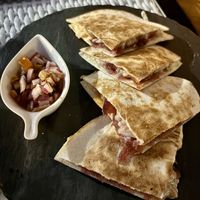 Red onion and vegan cheese quesadillas  at Cava in Teulada